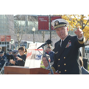 Vice Admiral Mark Fitzgerald gestures from the podium at the Veterans Memorial dedication ceremony