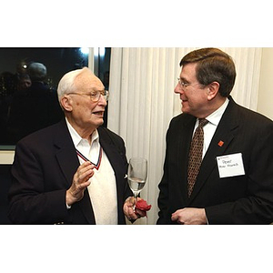 Two alumni converse at The National Council Dinner