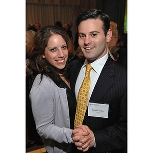 David Landau, right, dancing with a guest at the Huntington Society Dinner