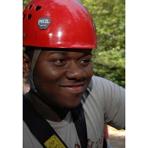 Ulysses Ifill smiles at the Torch Scholars Project Adventure Ropes Course