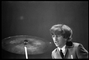 Ringo Starr on drums, in concert with the Beatles, Washington Coliseum