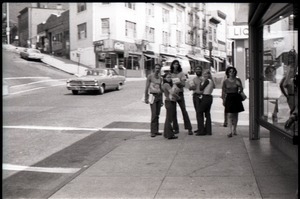 Crew distributing Free Spirit Press magazine: group of communards on a street corner, including Bill Grabin and Charlie Ribokas (center rear) and Kathy Murphy