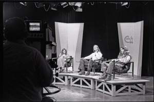 Commune members at the WGBY Catch 44 (public access television) interview: Anne Baker, Jim Baker, and Bruce Geisler on stage