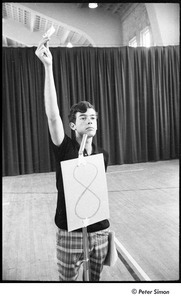 National Student Association Congress: delegate standing by the number '8', holding up name tag