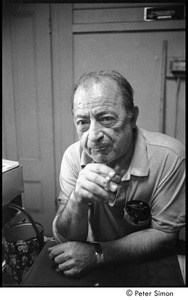 Fred Shibley (publisher of the Mid-Town Journal), smoking a cigarette