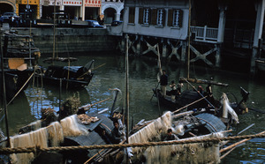 Fishing nets near a quay in Macau harbor