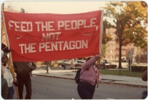 Protesters at a Nuclear Freeze demonstration, Northampton, carrying a banner reading 'Feed the people, not the Pentagon'
