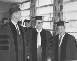 Charter Day: Governor Endicott Peabody, honoree George Meany, and John E. Powers inside Totman Gymnasium