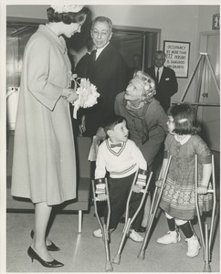 Princess Benedikte of Denmark meeting disabled children during her tour of an ICD facility