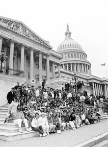 Visitors posed on the steps of the United States Capitol building