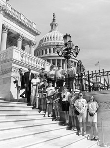 Congressman John W. Olver (2d from left) with group of visitors, posed on the steps of the United States Capitol building