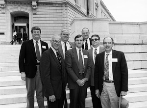 Congressman John W. Olver (2d from left) with group of visitors from Massachusetts corporations, posed on the steps of the United States Capitol building
