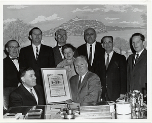 Mayor John F. Collins receiving a gift