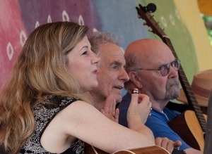 Dar Williams, David Amram, and Tom Paxton (from left) performing on the Rainbow stage at the Clearwater Festival
