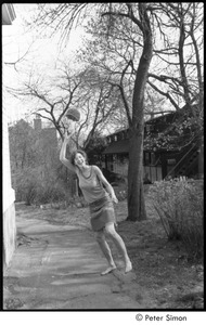 Ram Dass retreat at David McClelland's: woman swinging a basket
