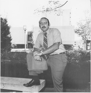 Arthur E. Petrosemolo standing outside