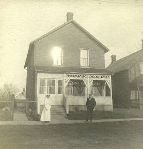 Peter J. Young and Annie Naismith outside their house in Almonte, Ontario