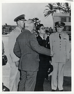 Mark Bortman with unidentified individuals