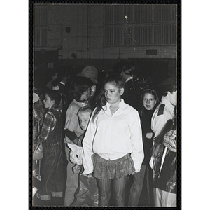 Children in Halloween costumes congregate at a Halloween party