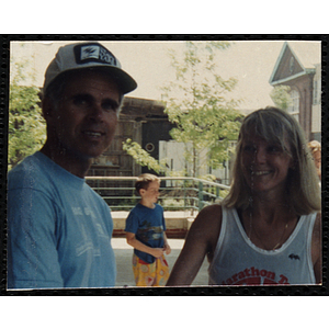 A woman and a man pose for a shot during the Battle of Bunker Hill Road Race