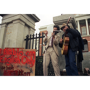 Participants at a rally for bilingual education at the steps of the Massachusetts State House