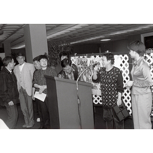 Speaker presenting award to Chinese Progressive Association Workers' Center