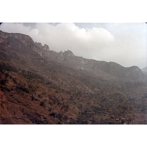 Rocky cliffs topping a mountain in China