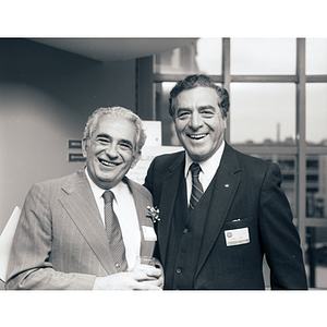 George Kariotis posing with George A. Luciano at the Kariotis Hall dedication