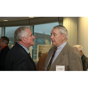 John Pignato converses with another man at the Veterans Memorial dinner