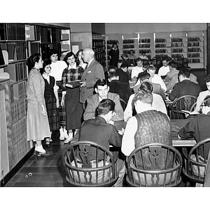 Students in Dodge Library on opening day, accompanied by President Ell