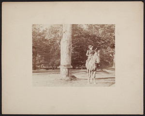Unidentified woman riding a horse