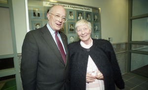 Dedication ceremonies for the Conte Polymer Center: unidentified man with Corinne Conte