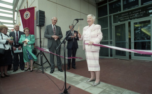 Dedication ceremonies for the Conte Polymer Center: Corinne Conte cutting the ribbon