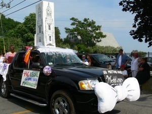 Parade car decked out to celebrate same sex marriage, with sign reading '446 legal same-sex marriages!' : Provincetown Carnival parade