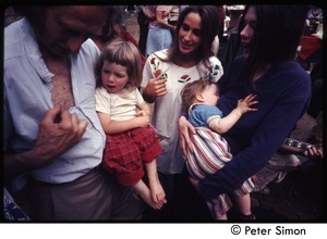 Middle-aged man with Lacey Mason, Catherine Blinder (l. to r.) and babies, Tree Frog Farm commune