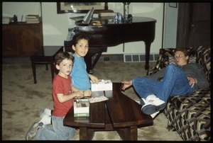 Three children in living room