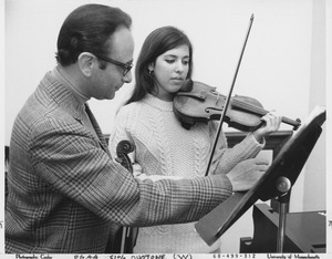 Julian and Estela Olevsky with violins