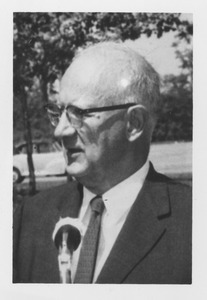 Conrad Wirth in front of microphone outside