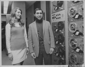 Maurice I. Levin standing in Language Lab with graduate student Jacqueline O'Dell