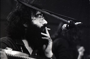 New Riders of the Purple Sage opening for the Grateful Dead at Sargent Gym, Boston University: Jerry Garcia smoking a joint