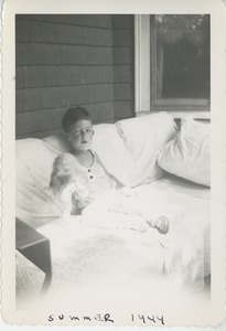 Joel Kahn seated on couch