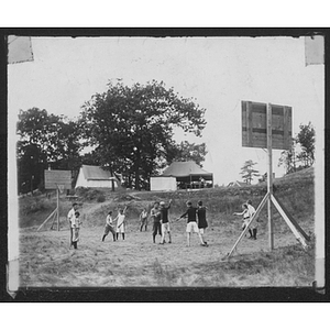 Youth playing basketball at Camp School, Allston