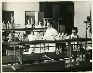 [Unidentified staff in Dispensary]