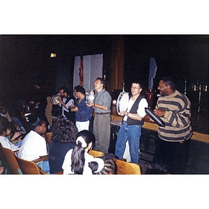 Areyto musicians performing before an audience of school children during a program sponsored by Young Audiences of Massachusetts.