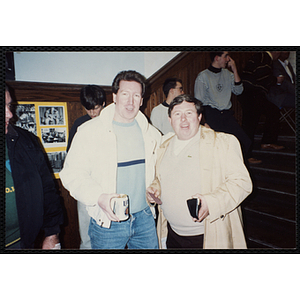 Two Bunker Hillbilly alumni smile for the camera at a reunion event