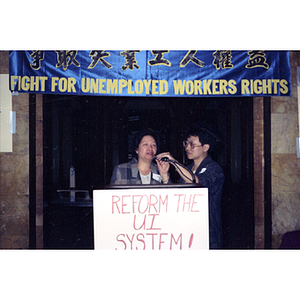 Speaker and Suzanne Lee at an unemployment insurance rally