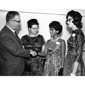 Freshmen female students meet with President Knowles and Dean Dorothy Dissell at the College of Liberal Arts