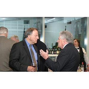 Mike Cronin (l) converses with Dennis Picard (r) at the Veterans Memorial dinner