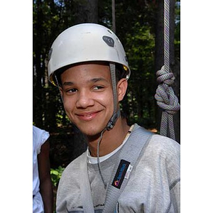 Odalis David Polanco smiles at Torch Scholars Project Adventure Ropes Course