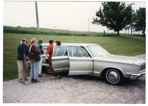 Group of women with a station wagon